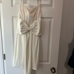 White revelry dress with big bow on the back